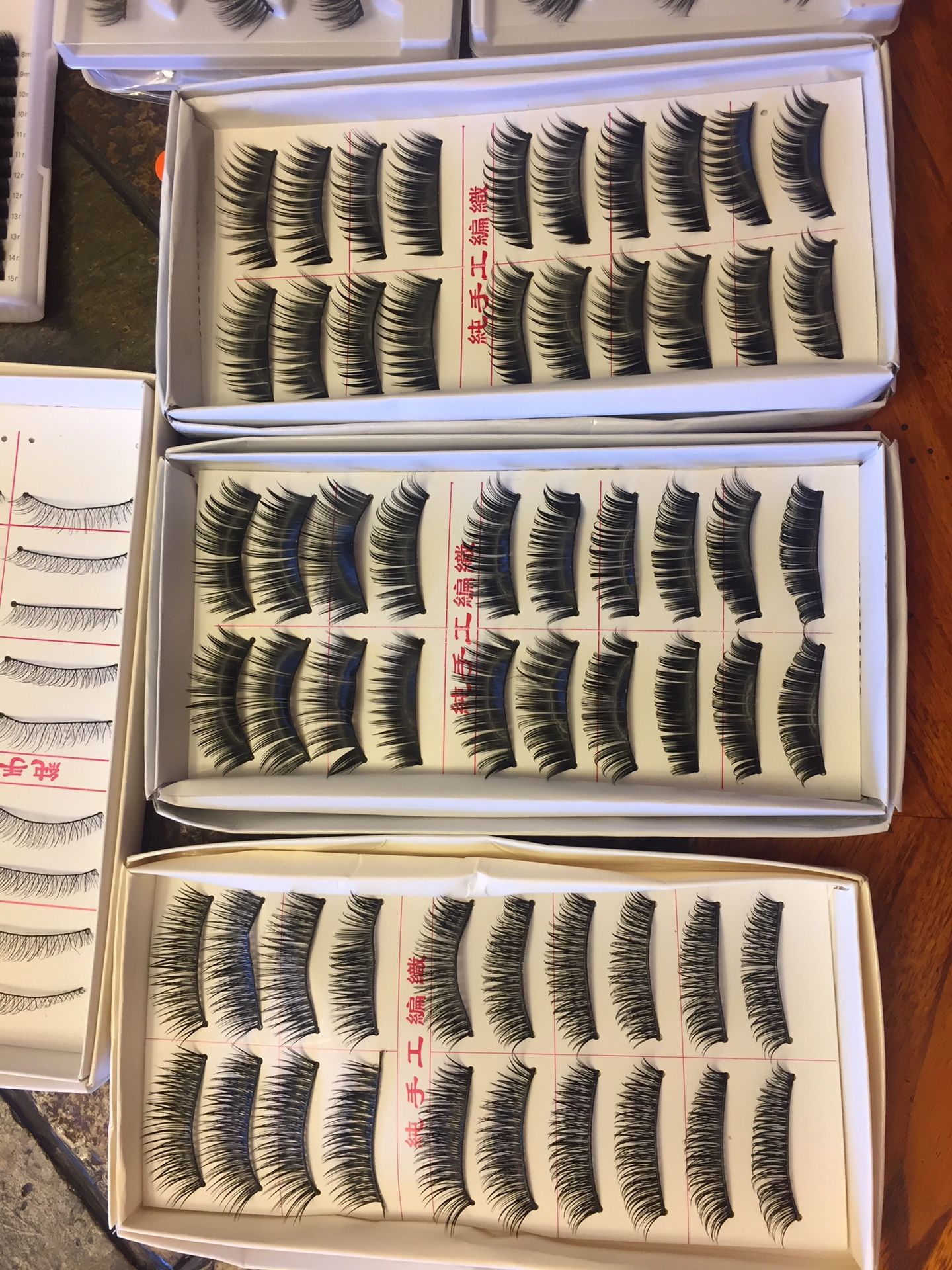 Brand new eyelashes 8 box of 110 eye lashes plus 21 individual lashes 1 trio lash 3x. Plus a box of individual eye lashes.