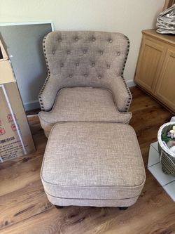 Armchair with ottoman