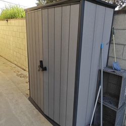 Storage Shed with Rack