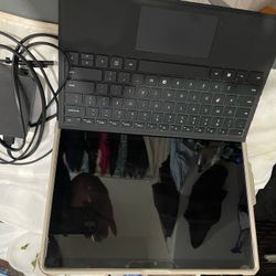 Surface Pro 7 256 Gb With Case, Keyboard, And 2 Cords That Go With It!