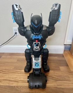 Fisher-Price Imaginext DC Super Friends Batman Bat-Tech Batbot In good condition This 2-foot tall robot transforms into a flight-mode battle bot p