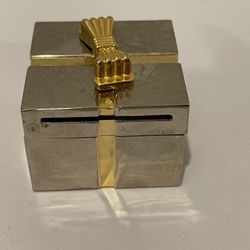 Xanadu Quartz clock with pearl face in silver & gold tone gift box. Not tested - sold AS IS