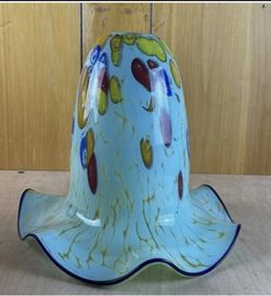 This is a vintage Murano glass lampshade with scattered colorful inclusions.