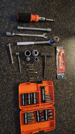 Assorted black and Decker bits, rachets, gator grip socket wrench etc