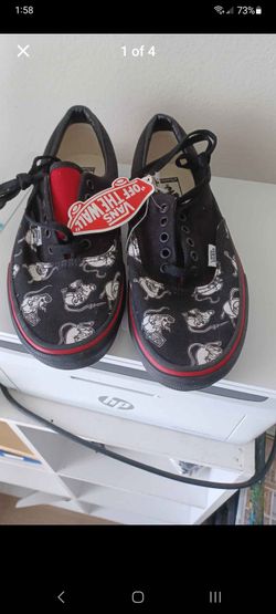 limited-edition black Vans low-top sneakers