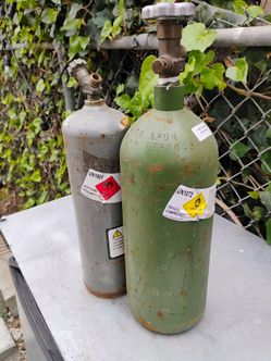 Oxygen and acetylene tanks both