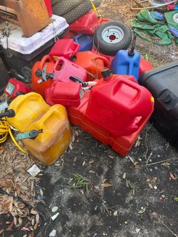 Lot of Gas Cans Various Sizes and Colors