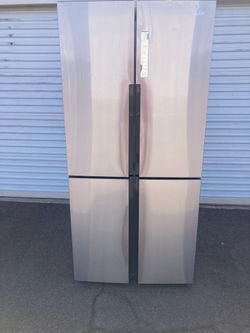 Haier 16.4 cubic foot four-door refrigerator, stainless steel, in good condition, clean and nice, one month warranty, delivery available. Dimensions: 