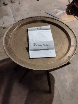 Unique antique copper"?" table