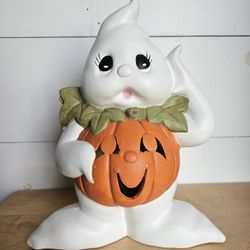 Vintage ceramic ghost w Jack-o-lantern belly. Halloween.