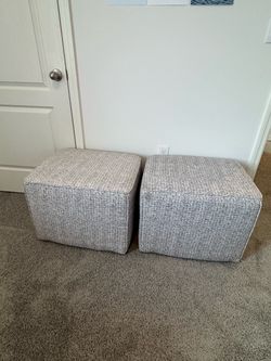 2 ottomans / footstools - model home furniture