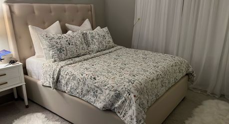 Queen upholstered bed