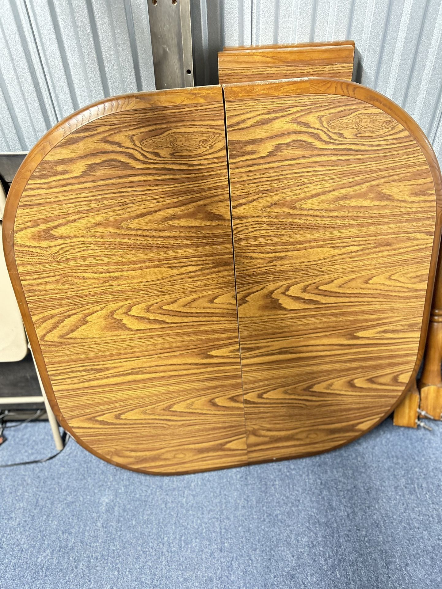 Oak Dining Table With Two Leave Attachments And Six Chairs W/ Brand New Cushions.