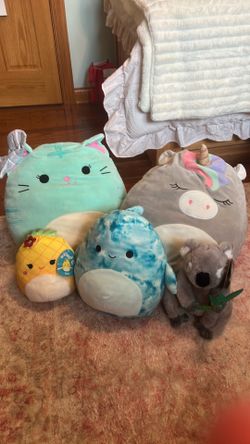 5 squish mellows and 1 stuffed animal
