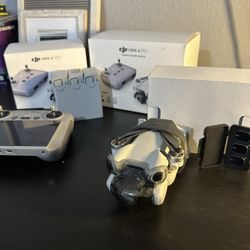 DJI Mini 4 Pro Bundle - RC2 Controller, 3 Batteries, Charging Hub, ND Filters