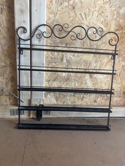 Five tier black metal wall mounted rack