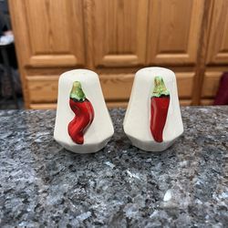 Vintage Ceramic Chili Peppers Pair of Salt And Pepper Shakers.  Preowned Never used.  