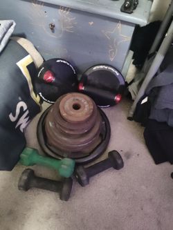 87#`s  in small hole weight plate and dumbell weights