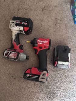 2 Milwaukee impact drivers
