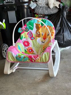 Girl rocker with toys
