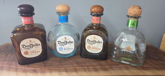 Empty don julio and patron bottles