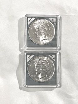 Uncirculated sealed in capsules 1922 piece silver dollars. These are valued at $96 each on US Coin book.