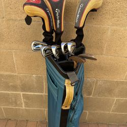 Golf Clubs- Taylormade Woods 3,5,7 And Cleveland 6-9 Irons, PW, SW, Putter 