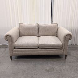 Beige Textured Fabric Loveseat with Rolled Arms