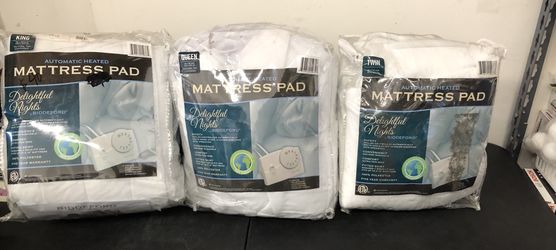 Heated mattress pad