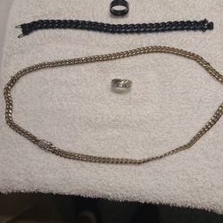 Two Rings One Necklace And One Bracelet 