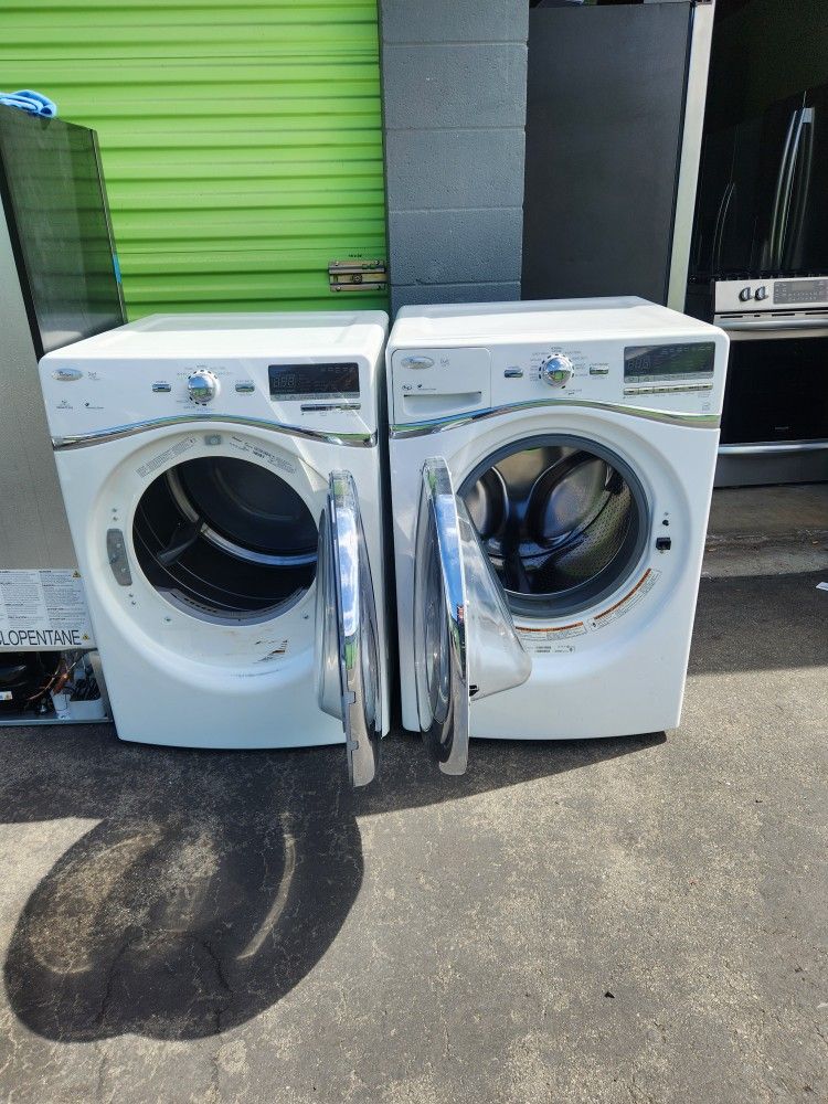 Two gas-powered washing machines in good condition, Whirlpool brand; one washer and one dryer