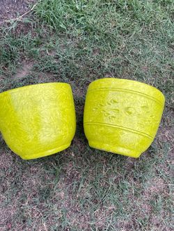 Small lime colored Mexican clay pots