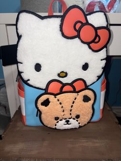 A hello kitty Loungefly back back, it’s about a medium size backpack