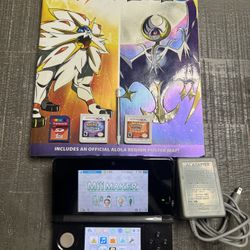 Nintendo 3DS With Games Pokemon Moon And Pokemon Sun With Official Strategy Guide, Memory Card, Stylus & Charger 