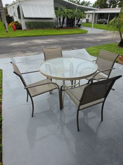 Table and 4 chairs