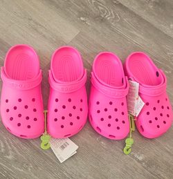 2 pairs Hot pink Crocs