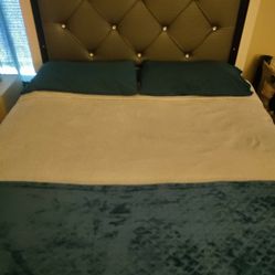 8 Piece Queen Bedroom Set With LED Lights On Bed