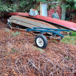12 Foot Jon Boat With Trailer And 8 Hp Evinrude 