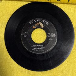 This item is a vintage Rod Lauren "If I Had A Girl / No Wonder" 45 RPM vinyl record released on the RCA Victor label (catalog number 47-7645).