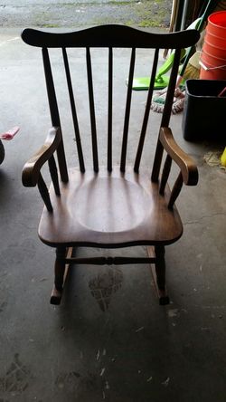 Good condition kids wooden rocking chair