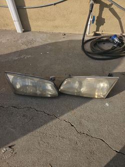 1(contact info removed) Toyota Camry Headlights pair