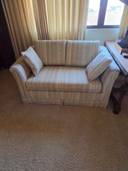 Loveseat with hide-a-bed