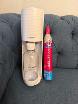 Soda Stream w/ back up unused sealed bottle. Make me an offer