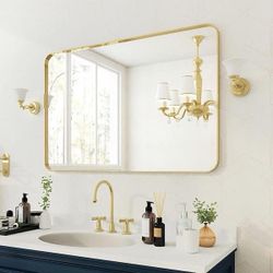 Y25 $70。48 in. W x 32 in. H Rectangular Aluminum Framed Wall Bathroom Vanity Mirror in Gold  With this elegant, framed design, gold framed mirrors are