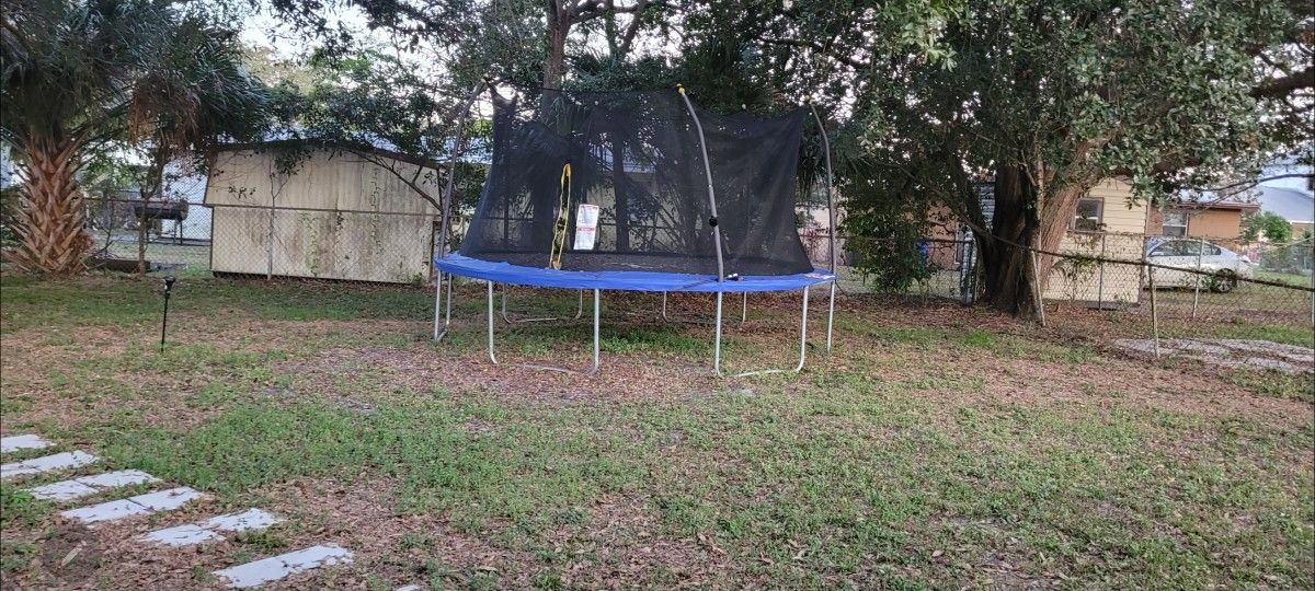 Used 14 Foot Trampoline with Safety Net - Great Condition!