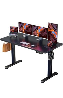 Electric standing pc table