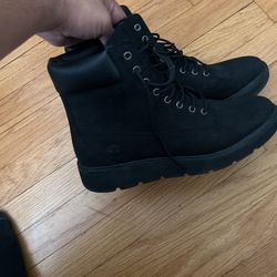 Woman’s Black Timberlands
