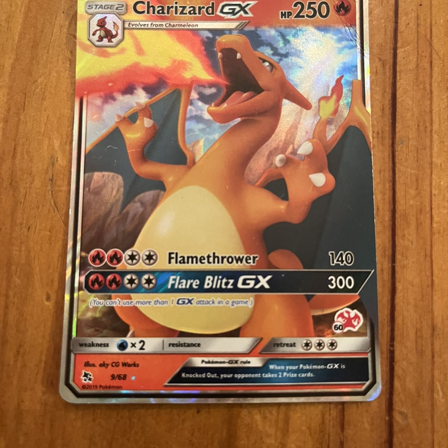 pokemon card value charizard gx Charizard GX (SM195) [Sun & Moon: Black Star Promos] Lightly Played Holofoil