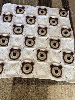‏baby blanket and girl dress
