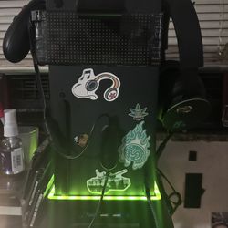 Xbox X con tarjeta de impresión de un Terra